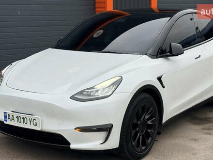 Білий Тесла Model Y, об'ємом двигуна 0 л та пробігом 50 тис. км за 28999 $, фото 1 на Automoto.ua