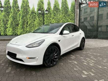 Білий Тесла Model Y, об'ємом двигуна 0 л та пробігом 84 тис. км за 28300 $, фото 1 на Automoto.ua