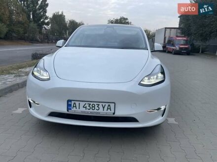 Белый Тесла Model Y, объемом двигателя 0 л и пробегом 64 тыс. км за 28500 $, фото 1 на Automoto.ua