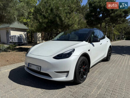 Белый Тесла Model Y, объемом двигателя 0 л и пробегом 59 тыс. км за 32000 $, фото 1 на Automoto.ua
