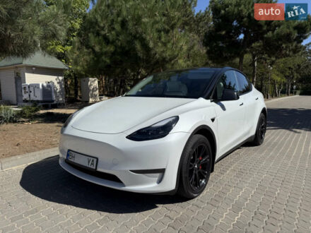 Білий Тесла Model Y, об'ємом двигуна 0 л та пробігом 59 тис. км за 32000 $, фото 1 на Automoto.ua