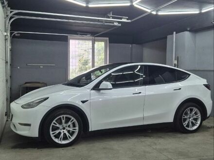 Белый Тесла Model Y, объемом двигателя 0 л и пробегом 49 тыс. км за 27999 $, фото 1 на Automoto.ua