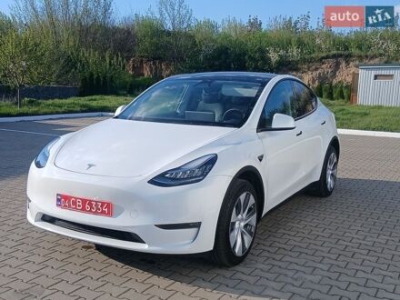 Белый Тесла Model Y, объемом двигателя 0 л и пробегом 65 тыс. км за 24500 $, фото 1 на Automoto.ua