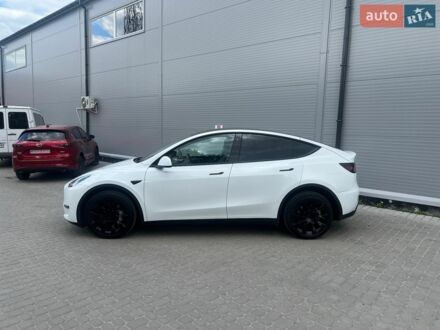 Белый Тесла Model Y, объемом двигателя 0 л и пробегом 51 тыс. км за 26999 $, фото 1 на Automoto.ua