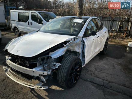Белый Тесла Model Y, объемом двигателя 1.87 л и пробегом 64 тыс. км за 15500 $, фото 1 на Automoto.ua