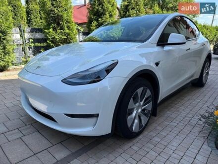 Белый Тесла Model Y, объемом двигателя 0 л и пробегом 65 тыс. км за 23400 $, фото 1 на Automoto.ua