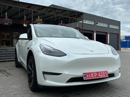 Білий Тесла Model Y, об'ємом двигуна 0 л та пробігом 70 тис. км за 23999 $, фото 1 на Automoto.ua