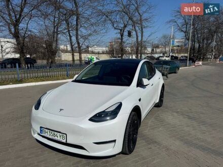 Белый Тесла Model Y, объемом двигателя 0 л и пробегом 58 тыс. км за 28000 $, фото 1 на Automoto.ua