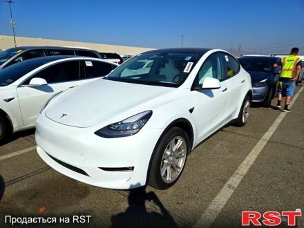 Белый Тесла Model Y, объемом двигателя 0.35 л и пробегом 50 тыс. км за 15050 $, фото 1 на Automoto.ua