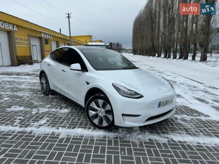 Белый Тесла Model Y, объемом двигателя 0 л и пробегом 100 тыс. км за 27500 $, фото 1 на Automoto.ua