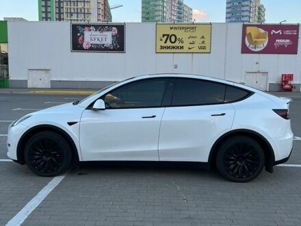 Белый Тесла Model Y, объемом двигателя 0 л и пробегом 56 тыс. км за 26500 $, фото 1 на Automoto.ua