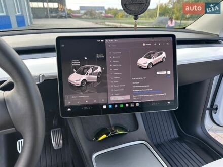 Белый Тесла Model Y, объемом двигателя 0 л и пробегом 33 тыс. км за 26000 $, фото 1 на Automoto.ua