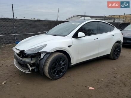 Белый Тесла Model Y, объемом двигателя 0 л и пробегом 52 тыс. км за 11000 $, фото 1 на Automoto.ua