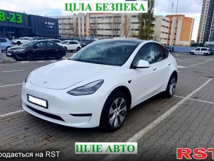 Білий Тесла Model Y, об'ємом двигуна 0.38 л та пробігом 35 тис. км за 29900 $, фото 1 на Automoto.ua