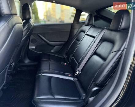 Черный Тесла Model Y, объемом двигателя 0 л и пробегом 113 тыс. км за 21999 $, фото 43 на Automoto.ua