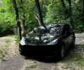 Черный Тесла Model Y, объемом двигателя 0 л и пробегом 99 тыс. км за 23000 $, фото 1 на Automoto.ua