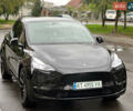 Черный Тесла Model Y, объемом двигателя 0 л и пробегом 82 тыс. км за 26000 $, фото 1 на Automoto.ua