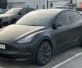 Чорний Тесла Model Y, об'ємом двигуна 0 л та пробігом 100 тис. км за 27999 $, фото 2 на Automoto.ua
