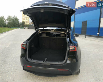 Черный Тесла Model Y, объемом двигателя 0 л и пробегом 63 тыс. км за 27500 $, фото 28 на Automoto.ua