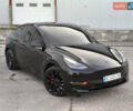 Черный Тесла Model Y, объемом двигателя 0 л и пробегом 57 тыс. км за 23950 $, фото 1 на Automoto.ua