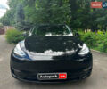 Черный Тесла Model Y, объемом двигателя 0 л и пробегом 136 тыс. км за 22790 $, фото 1 на Automoto.ua