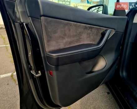 Черный Тесла Model Y, объемом двигателя 0 л и пробегом 128 тыс. км за 29999 $, фото 28 на Automoto.ua