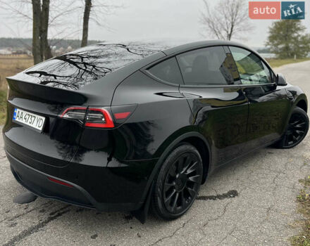 Черный Тесла Model Y, объемом двигателя 0 л и пробегом 97 тыс. км за 19999 $, фото 3 на Automoto.ua