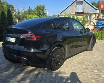 Черный Тесла Model Y, объемом двигателя 0 л и пробегом 98 тыс. км за 24499 $, фото 4 на Automoto.ua