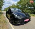 Черный Тесла Model Y, объемом двигателя 0 л и пробегом 70 тыс. км за 23999 $, фото 1 на Automoto.ua