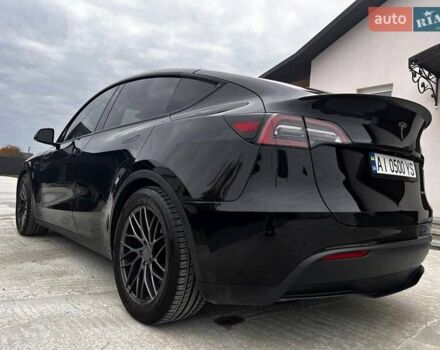 Чорний Тесла Model Y, об'ємом двигуна 0 л та пробігом 73 тис. км за 27999 $, фото 4 на Automoto.ua