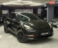 Черный Тесла Model Y, объемом двигателя 0 л и пробегом 124 тыс. км за 24900 $, фото 1 на Automoto.ua