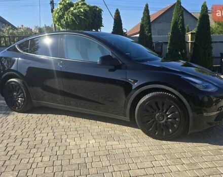 Черный Тесла Model Y, объемом двигателя 0 л и пробегом 98 тыс. км за 24499 $, фото 2 на Automoto.ua