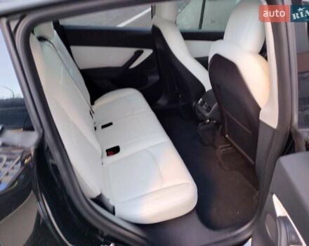 Черный Тесла Model Y, объемом двигателя 0 л и пробегом 97 тыс. км за 28000 $, фото 11 на Automoto.ua