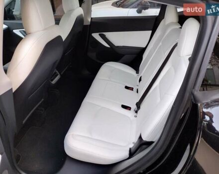 Черный Тесла Model Y, объемом двигателя 0 л и пробегом 97 тыс. км за 28000 $, фото 18 на Automoto.ua