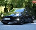 Черный Тесла Model Y, объемом двигателя 0 л и пробегом 82 тыс. км за 24950 $, фото 1 на Automoto.ua