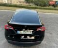 Черный Тесла Model Y, объемом двигателя 0 л и пробегом 101 тыс. км за 24999 $, фото 1 на Automoto.ua