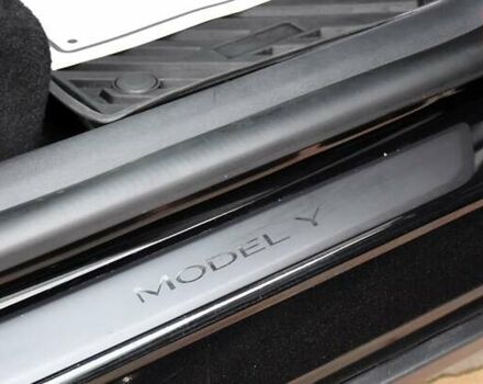 Черный Тесла Model Y, объемом двигателя 0 л и пробегом 73 тыс. км за 25950 $, фото 55 на Automoto.ua
