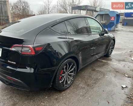 Черный Тесла Model Y, объемом двигателя 0 л и пробегом 90 тыс. км за 32818 $, фото 4 на Automoto.ua