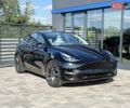 Черный Тесла Model Y, объемом двигателя 0 л и пробегом 50 тыс. км за 22900 $, фото 1 на Automoto.ua
