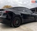 Чорний Тесла Model Y, об'ємом двигуна 0 л та пробігом 73 тис. км за 27999 $, фото 7 на Automoto.ua