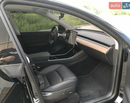 Черный Тесла Model Y, объемом двигателя 0 л и пробегом 63 тыс. км за 27500 $, фото 26 на Automoto.ua
