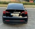 Черный Тесла Model Y, объемом двигателя 0 л и пробегом 101 тыс. км за 24999 $, фото 19 на Automoto.ua