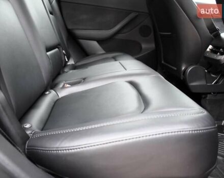 Черный Тесла Model Y, объемом двигателя 0 л и пробегом 73 тыс. км за 25950 $, фото 59 на Automoto.ua