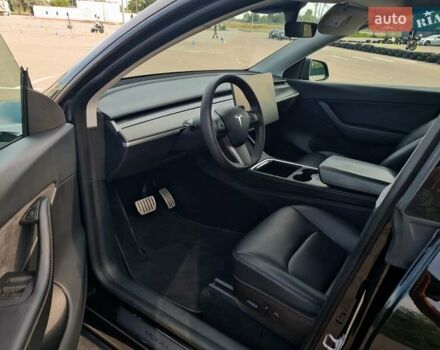 Черный Тесла Model Y, объемом двигателя 0 л и пробегом 128 тыс. км за 29999 $, фото 29 на Automoto.ua