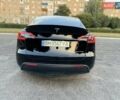 Черный Тесла Model Y, объемом двигателя 0 л и пробегом 101 тыс. км за 24999 $, фото 2 на Automoto.ua