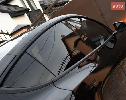 Черный Тесла Model Y, объемом двигателя 0 л и пробегом 73 тыс. км за 25950 $, фото 25 на Automoto.ua