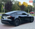 Черный Тесла Model Y, объемом двигателя 0 л и пробегом 102 тыс. км за 24999 $, фото 3 на Automoto.ua