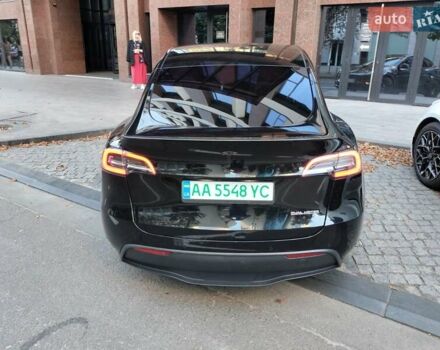 Черный Тесла Model Y, объемом двигателя 0 л и пробегом 97 тыс. км за 28000 $, фото 2 на Automoto.ua