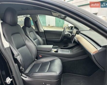 Черный Тесла Model Y, объемом двигателя 0 л и пробегом 127 тыс. км за 26990 $, фото 26 на Automoto.ua