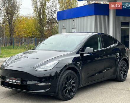 Черный Тесла Model Y, объемом двигателя 0 л и пробегом 5 тыс. км за 24999 $, фото 1 на Automoto.ua
